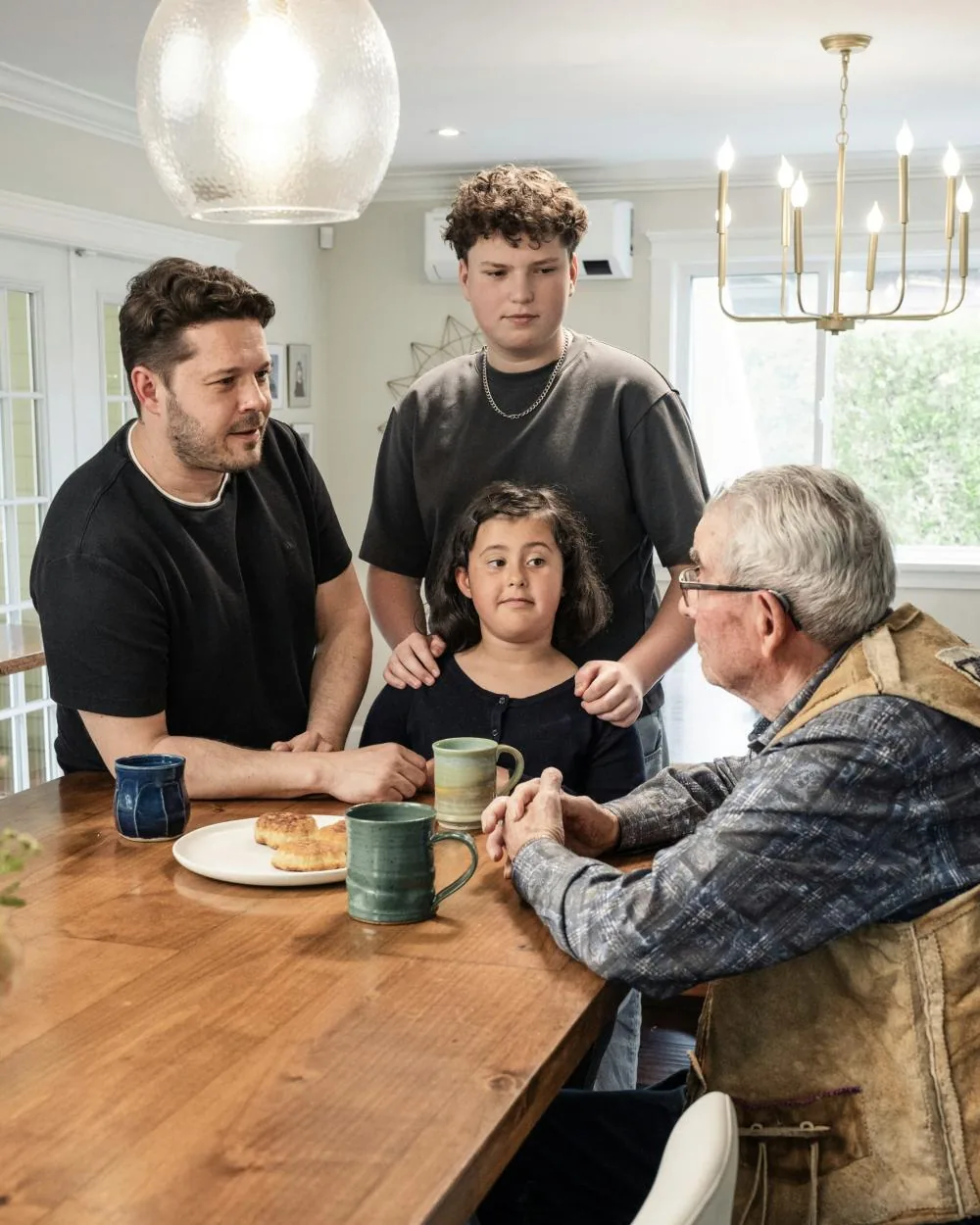 A family talking around the kitchen table